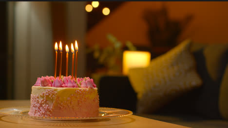 Close-Up-Of-Party-Celebration-Cake-For-Birthday-Decorated-With-Icing-And-Candles-On-Table-At-Home-1